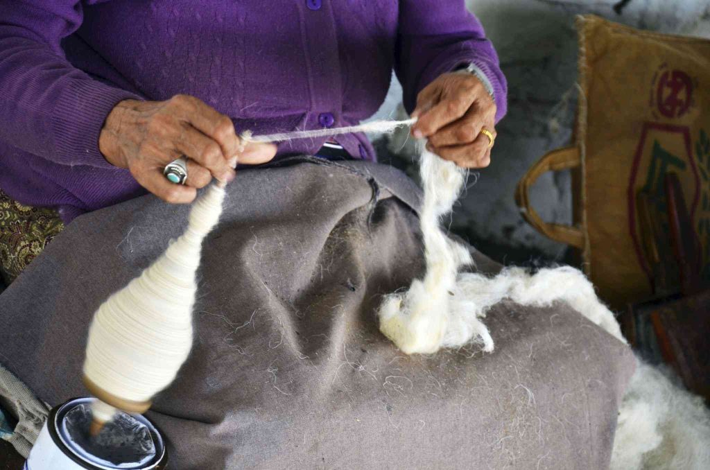 Fiber to thread spinning process in pashmina.