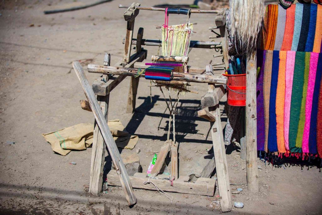 Traditional handlooms' role in Pashmina production.